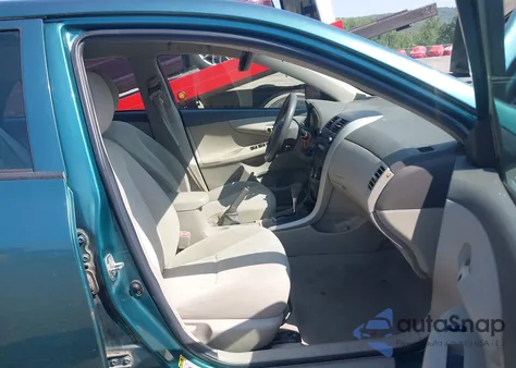 2009 Toyota Corolla Le from USA, damaged, VIN 1NXBU40EX9Z041141